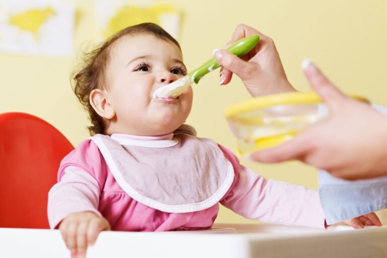 Baby Being fed with a spoon