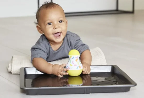 Baby playing with a toy