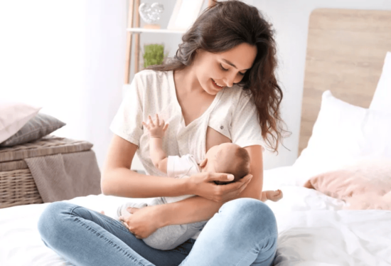 Mother breastfeeding a baby